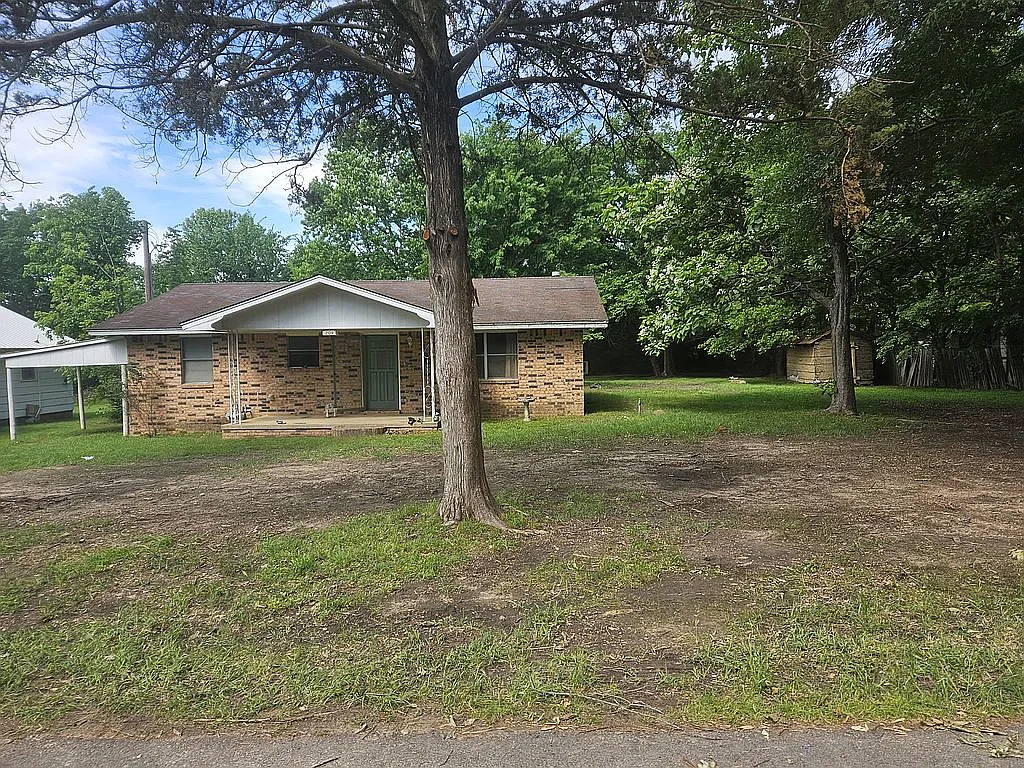Spacious Brick Home on Double Lots with Expansive Yard and Detached Building