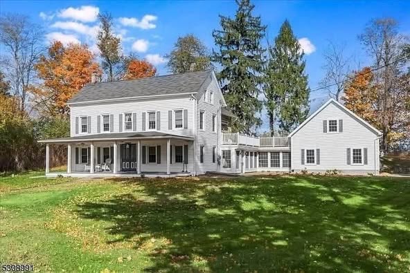 Elegant Colonial Farmhouse on 55 Acres with Spring-Fed Pond and Modern Comforts